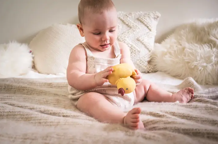 Tikiri Toys Tara the Duck Natural Rubber Teether, Rattle & Bath Toy