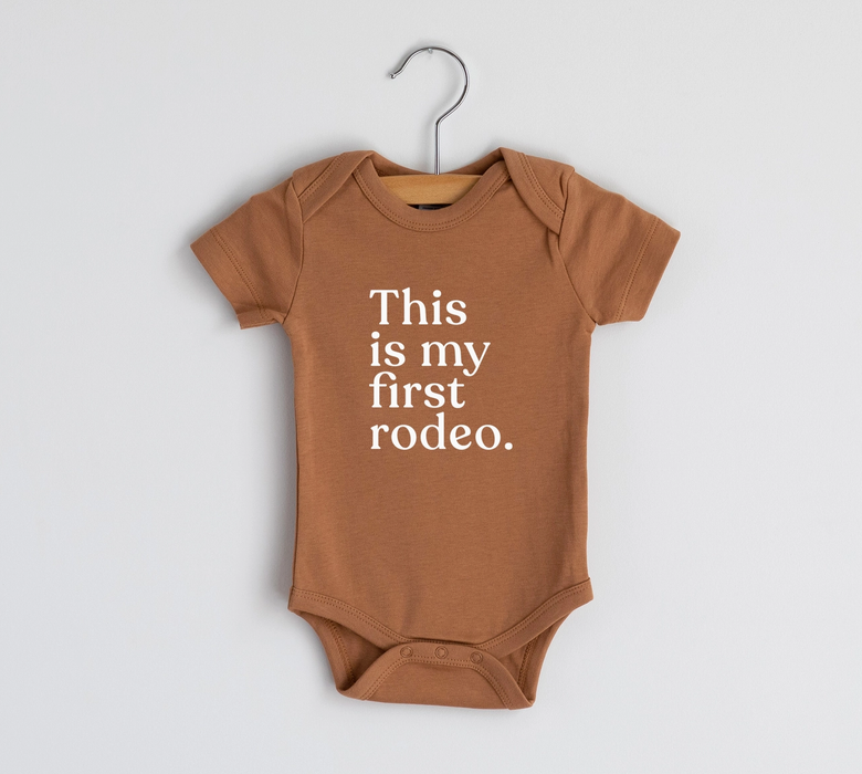 Gladfolk This Is My First Rodeo Baby Bodysuit - Camel