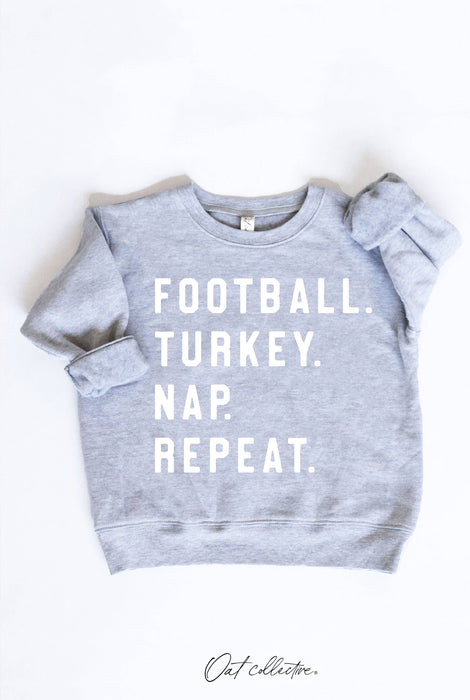 FOOTBALL. TURKEY. NAP. REPEAT.  Toddler Graphic Sweatshirt